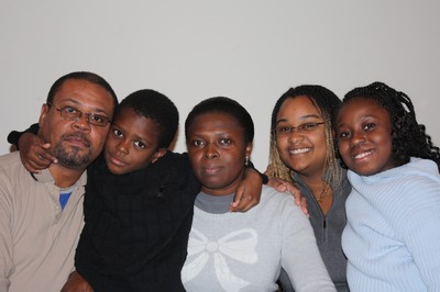 The Debrosse family at their new home in New Windsor.