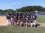 Players pose for a team photo after Saturday's victories in the tournament.