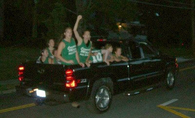 The softball team honks through town