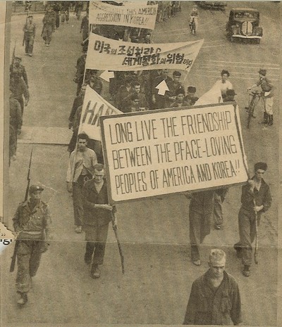 Forced propaganda march with Mellin and other POWs