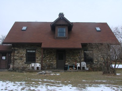 The stone cottage holds the group's office.