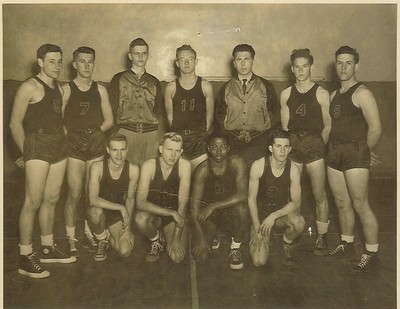 The 1948-49 varsity basketball team.  Al Longinott is on the right.