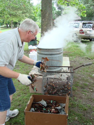 Kenn Brodmerkel prepares to steam lobsters.