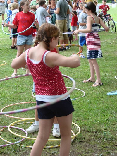 Girls practiced their hoola-hoop skills before the competition.