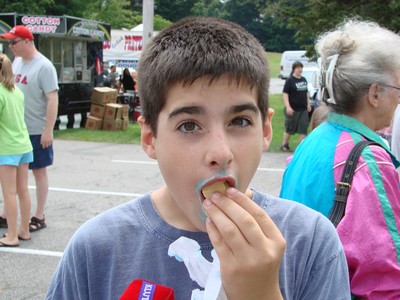 Luke Haggerty won the pie-eating competition in the 12-year-old category, then still had room to devour an ice cream cone.