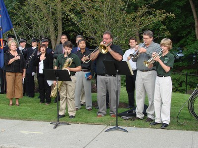 Members of the middle school band played patriotic tunes.