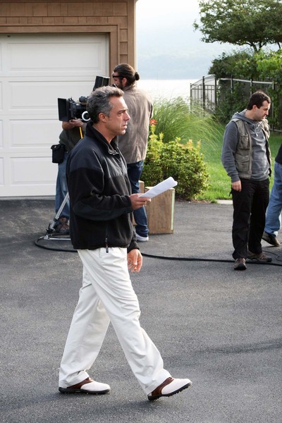 Titus Welliver walks across the set during a break in shooting.  Photo by Mary Ann G. Neuman. 