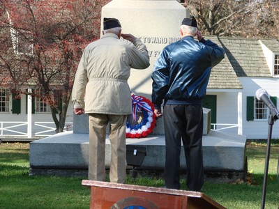 Veterans Andy Maroney and Bill Fulton laid a wreath at the monument.