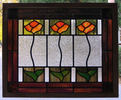 Thom's stained glass lights up any window.