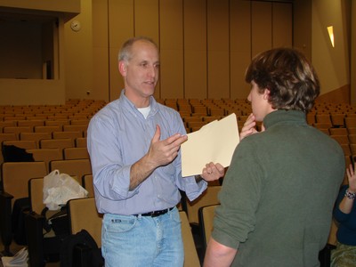 Rich Aufiero gives direction to a student actor in a production last year.