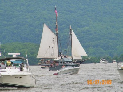 The Onrust yacht with a coast guard boat in front.  Photo by Cindy Anderson.