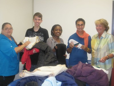 (L to R)  Washingtonville High School Head Custodian, Betty Mann, with students Vance Consalbo, Brittney Singletary, Gerard Fischetti and coat sale co-chair, Barbara Fogarty.