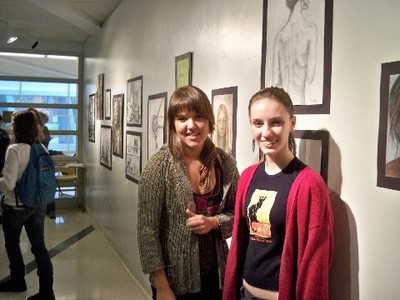 Kaija Hazirjian and Kayla Noble with some of their artwork.  Photo by Jaci Canning Murphy.