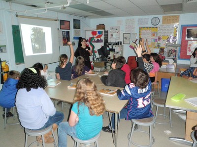 Students were eager to talk about landscape painting with the museum educator.