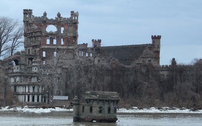 The recent damage is visible in the tower wall.  Photo by Thom Johnson.
