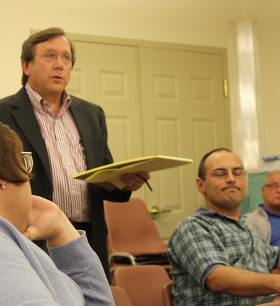 Jonathan Chase (standing) and Andrew Argenio (seated) both spoke out at Monday's meeting.