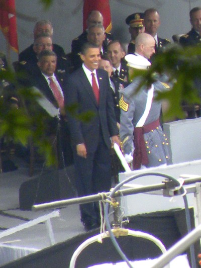 A cadet salutes President Obama.