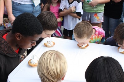 Adrian Carter (on left) won the pie-eating contest two times.
