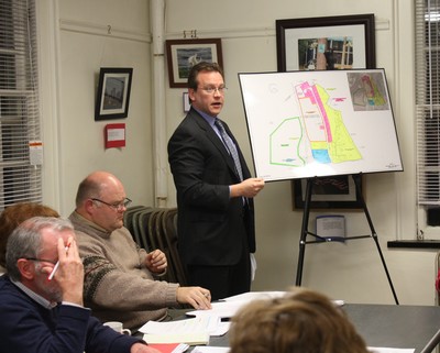 NYMA board president David Fields presents the proposal for subdividing the NYMA property.