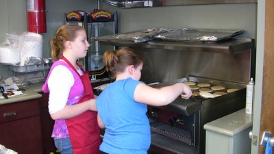 Flipping pancakes to meet the growing demand.