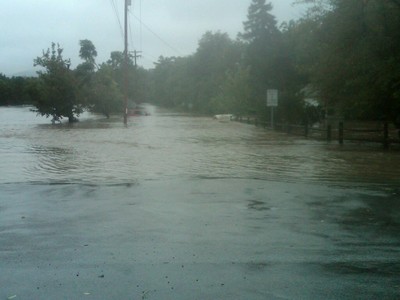 A vehicle is submerged on Taylor Road at Otterkill.  Photo by Officer Mike Lug.