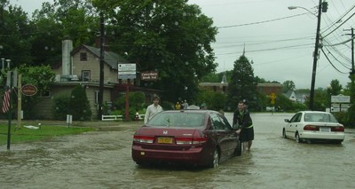 A car stuck in the water on Main Street.  Photo by Linda Bates.