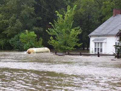 A propane tank floats by a house on Taylor Road. Photo by Peter Wood.