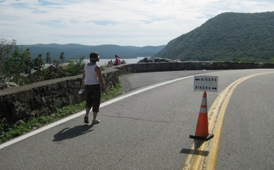 Amy Lawless approaches High Point after a walk from the village on Route 218.
