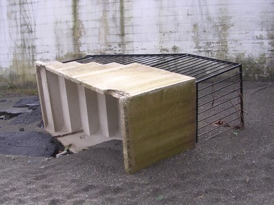 An emergency staircase was knocked on its side by the flooding.