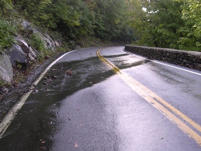 Water spilled across Route 218. Photo by Charlie Scirbona.