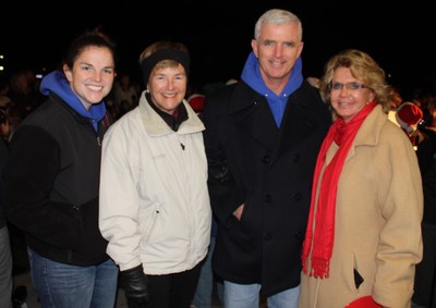 Michael Kelly, the official tree lighter, with his daughter, Mary (l), wife, Ellen, and Chamber president Helen Bunt.
