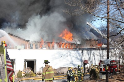 Firefighters struggled to control the fire at the building housing Superior Packaging.