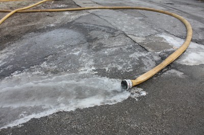 Water hoses filled with ice created a problem for firefighters.