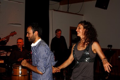 Maia Martinez dances a salsa with an unidentified partner.