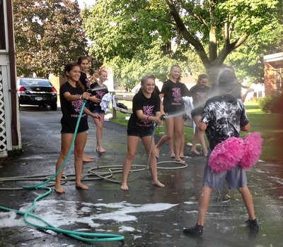 Team Pink Dragon car wash clean up.