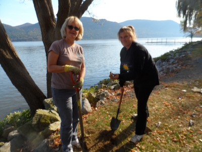 Photo by Jim Lennon. Elizabeth Heath and Lisa Morasse of the Cornwall Garden Club plant 200 daffodil bulbs at COH Donahue Memorial Riverfront Park
