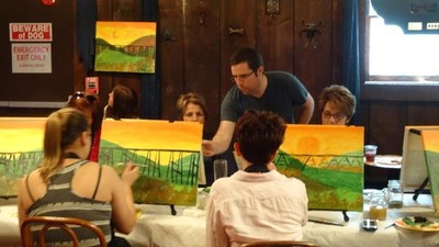 Dan Lennon instructing painters for a 