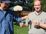 Steve Rice & Charlie Quinn examine bottles