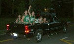 The softball team honks through town