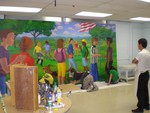 Students at work on the mural