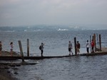 Children playing at the riverfront.