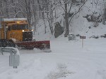 The plow chugs up Mountain Road.