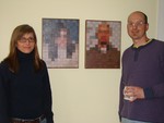 Thom & Jackie by their pixelated portraits that Thom created.