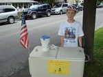 Brendan Smith sold cold drinks on Hudson Street to raise money to provide phone cards to soldiers.