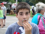 Luke Haggerty won the pie-eating competition in the 12-year-old category, then still had room to devour an ice cream cone.