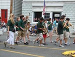 The middle school band marches under the eye of music teacher Valerie Ransbottom.