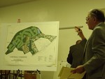 Attorney Jacobowitz and a drawing of the planned development.