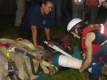 The horse was secured on a glide before bandaging its leg in the night rescue.