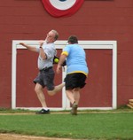 Town supervisor Kevin Quigley tried to dodge the ball but was tagged out by pitcher Matt Clancy.