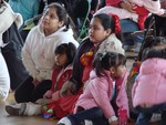 The young girls were captivated by the performances.